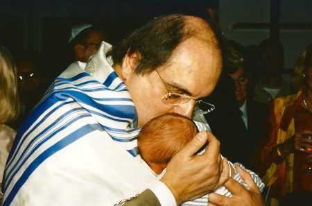 1999.07: Leon Charney & his baby boy Nati at the Bris