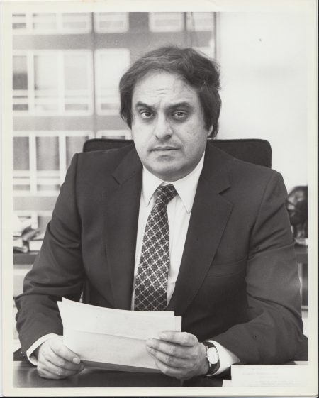 Leon Charney Portrait at Real Estate Office Desk, age 45 (estimated)