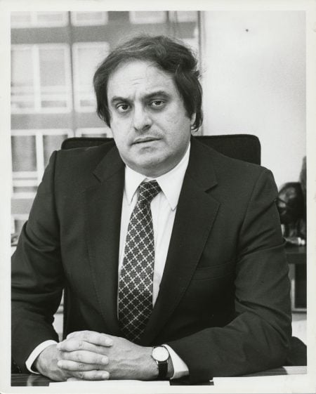 Leon Charney Portrait at Real Estate Office Desk, age 45 (estimated)